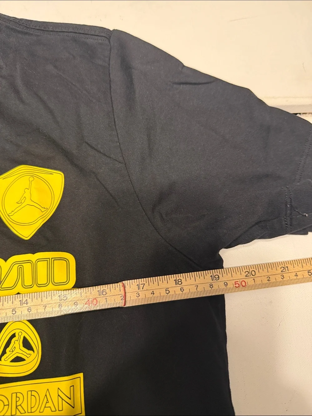 Jordan Short Sleeve Crew Tee in Black with Yellow Logo Graphics